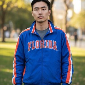 Youth size L 16-18 Florida gators puff jacket with stitched lettering. So nice!